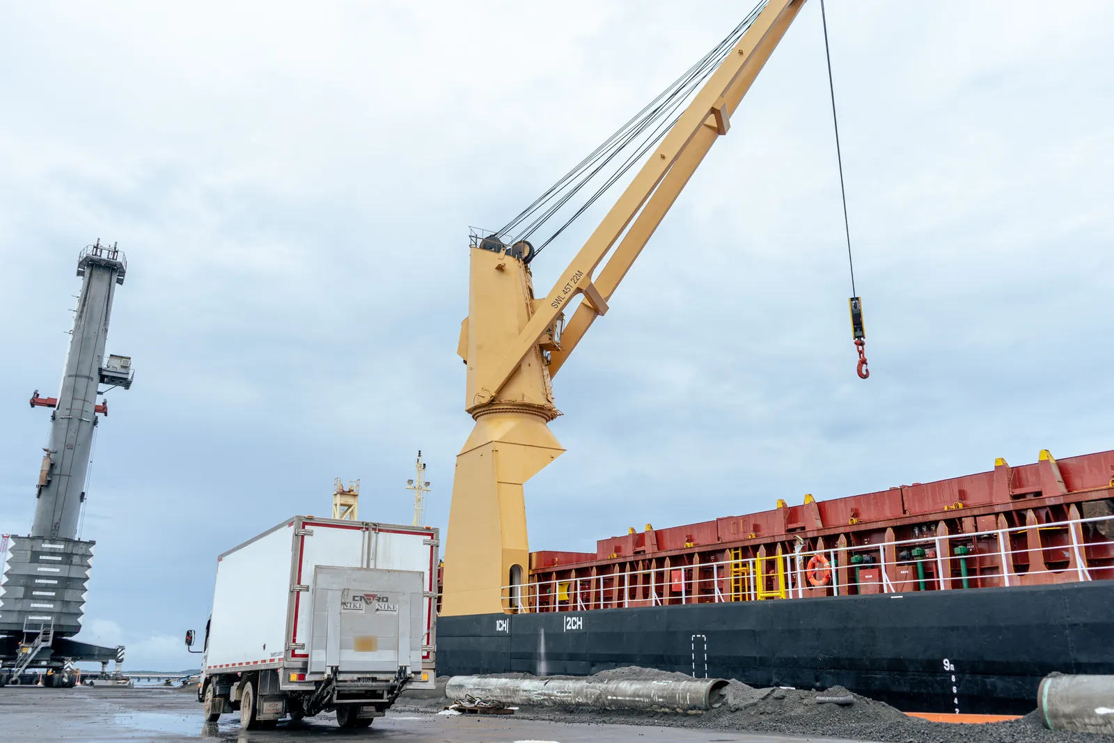 Our refrigerated truck alongside a vessel at the quay, for spare parts delivered on board